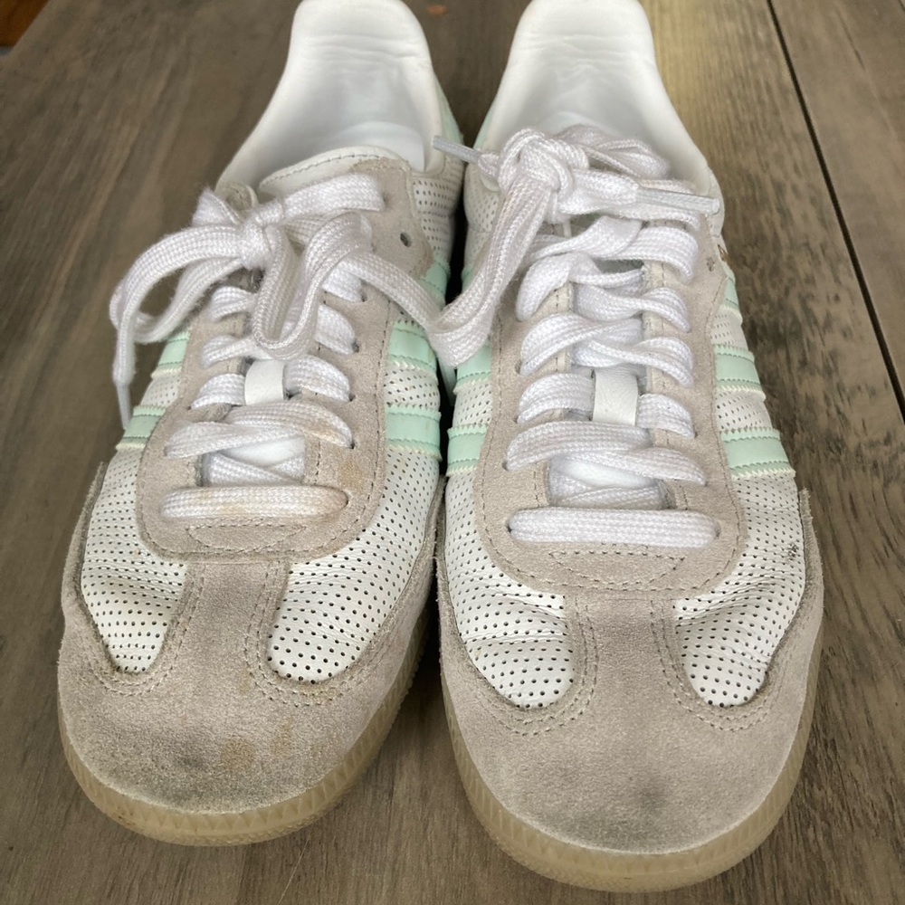 Adidas Sambas. Some wear.